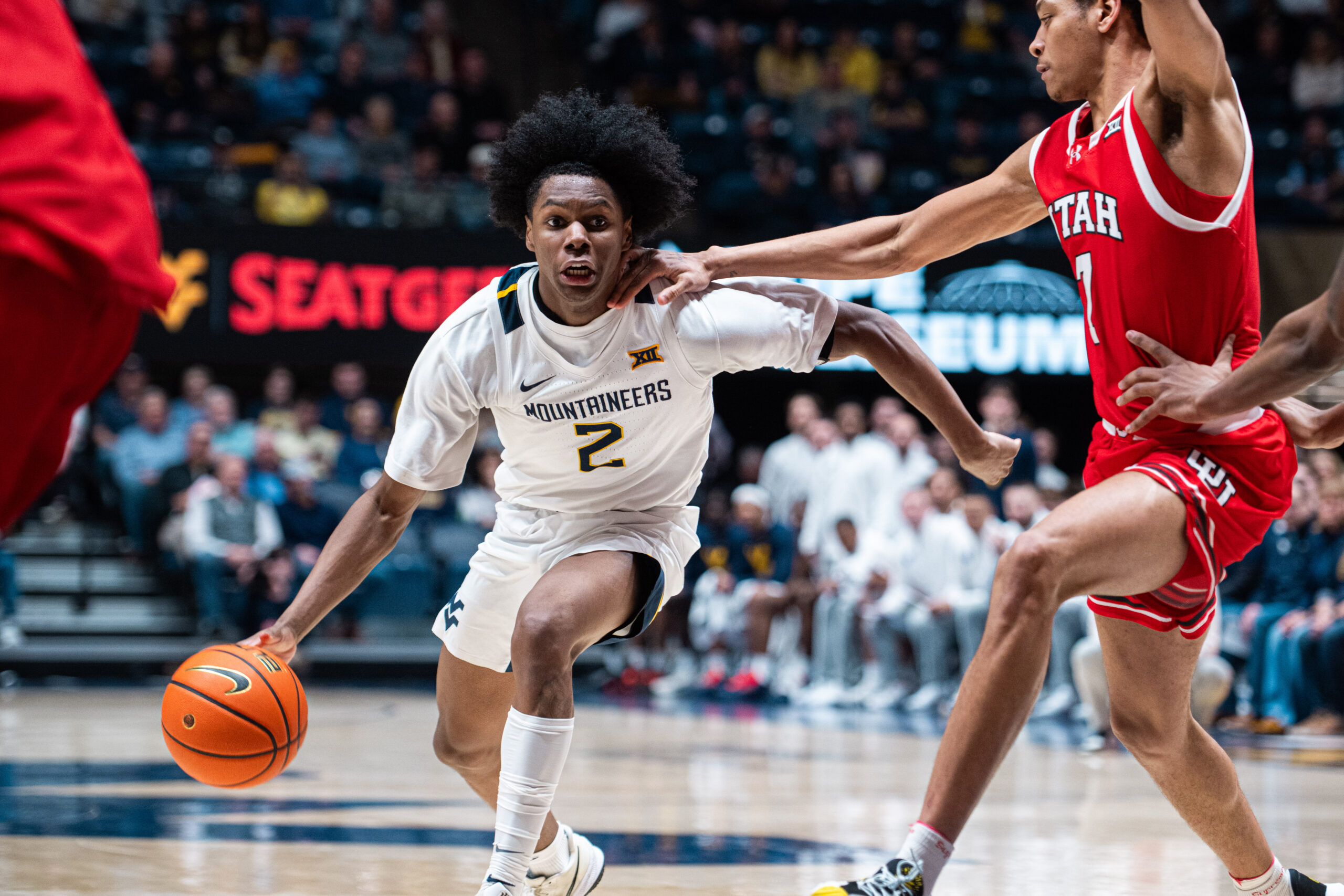 Utah never trails in 61-56 upset against West Virginia